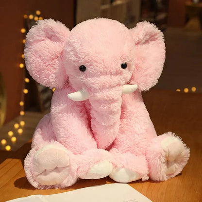 Peluche éléphant poilu aux petites défenses
