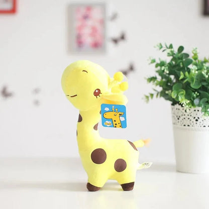Peluche girafe jaune à la grosse tête
