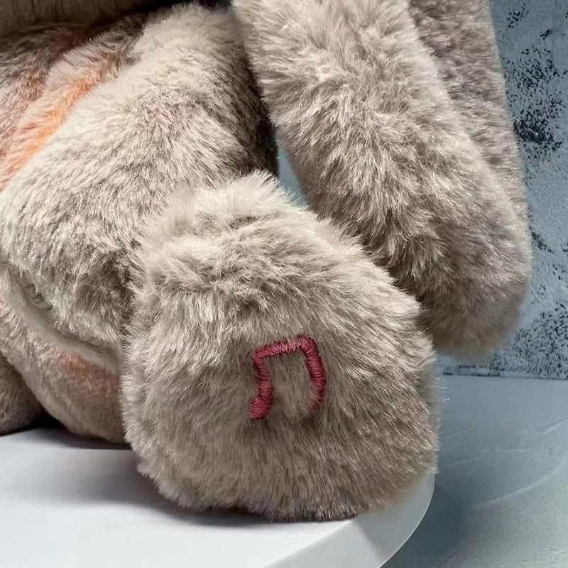 Peluche lapin doux berceuse relaxante pour enfant