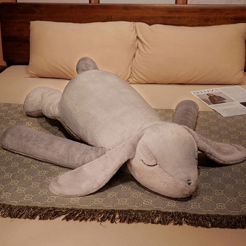 Peluche lapin endormi