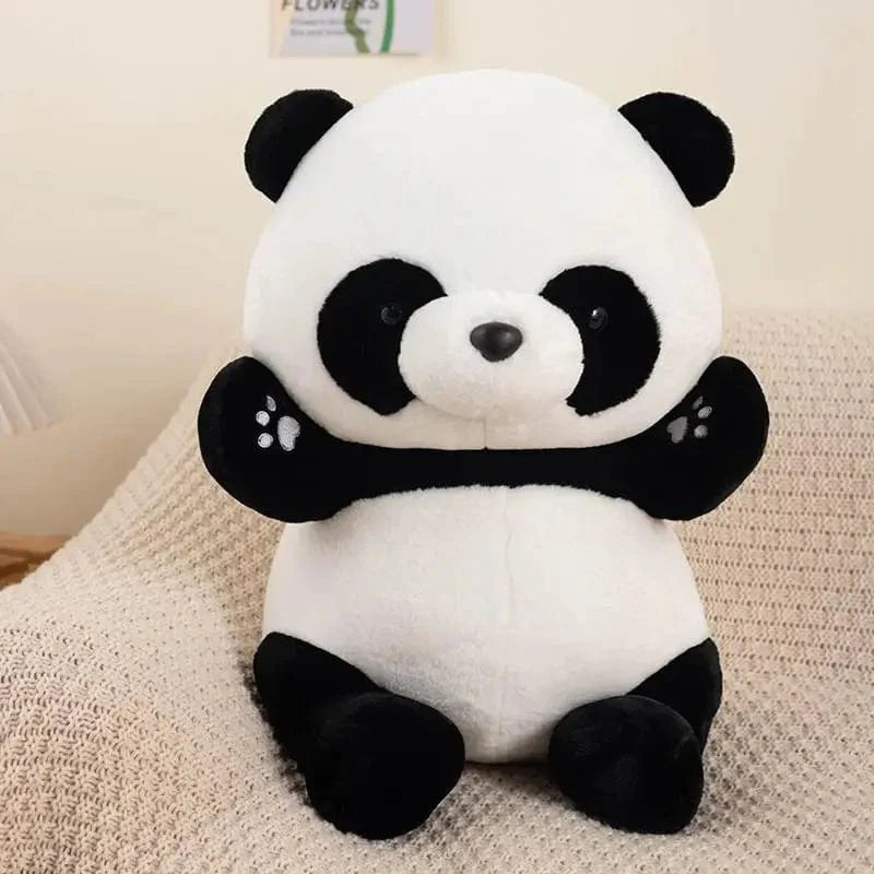 Peluche panda assise et joyeuse