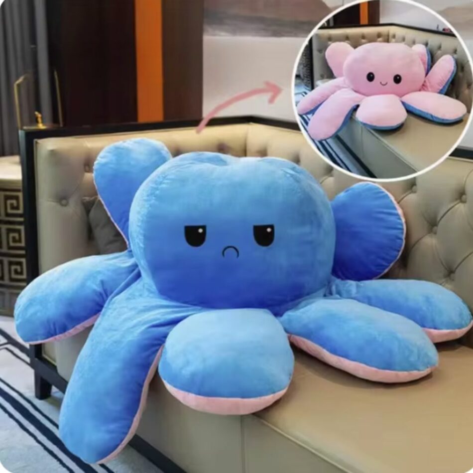Peluche pieuvre géante réversible humeur joyeuse triste