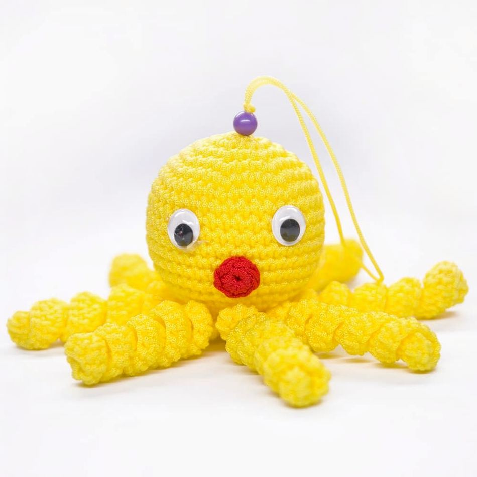 Peluche poulpe jaune enfant douce câlin océan tressée