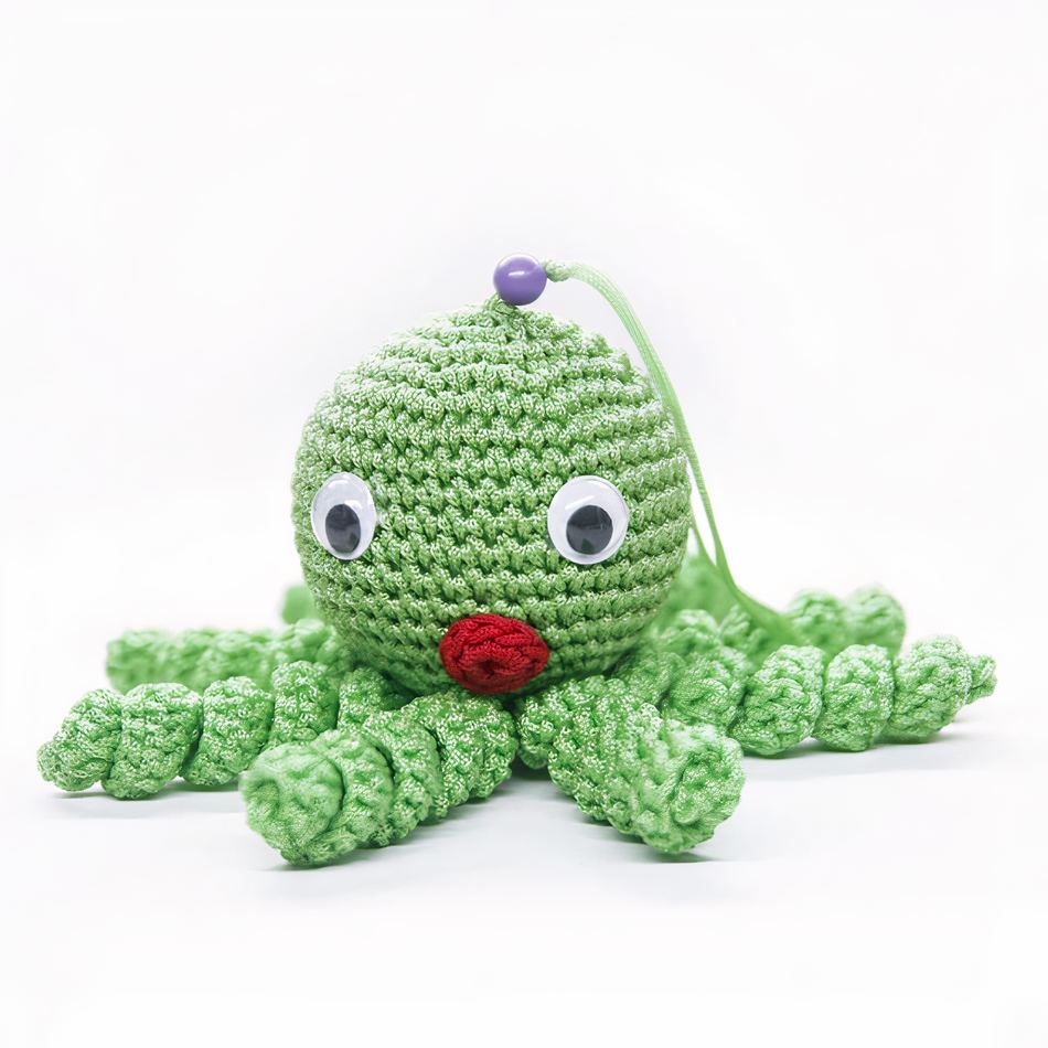 Peluche poulpe verte enfant câlin doux tressé