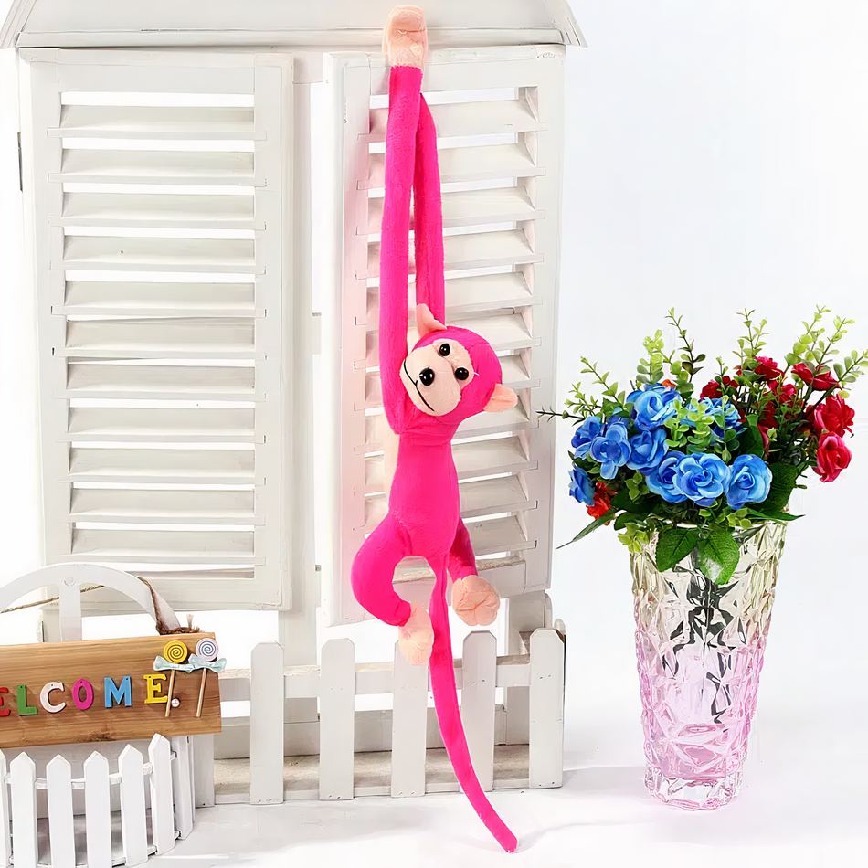Peluche singe kawaii fushia longue queue douillet enfant