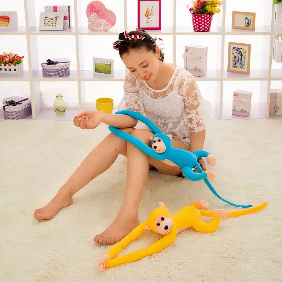 Peluche singe kawaii jaune moelleux longue queue enfant