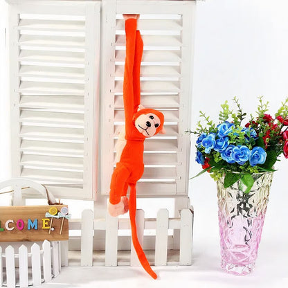 Peluche singe kawaii orange câlin queue longue douce