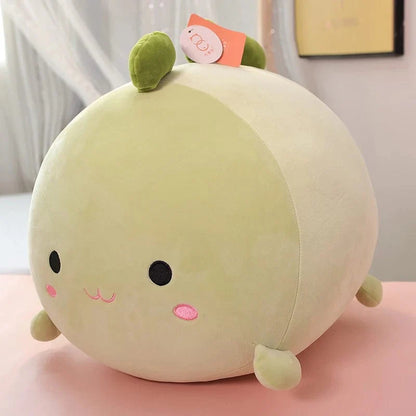 Peluche squishmallow dinosaure vert