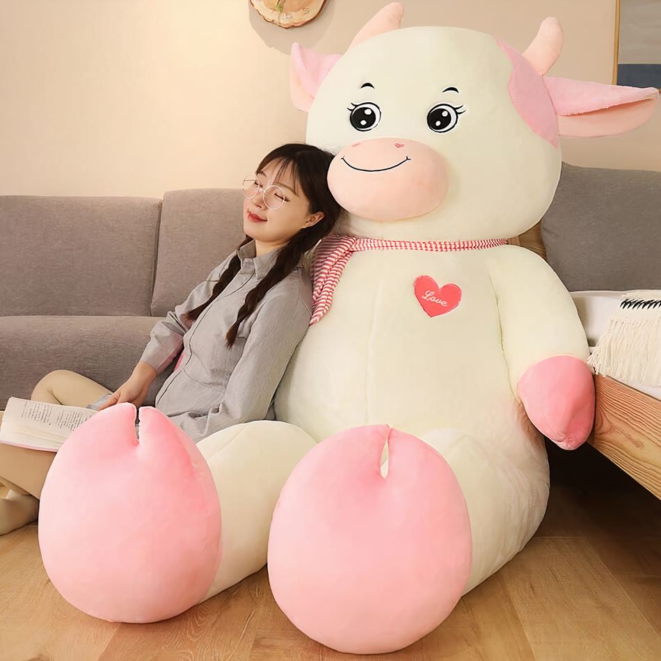 Peluche vache géante douce blanche rose câline enfant